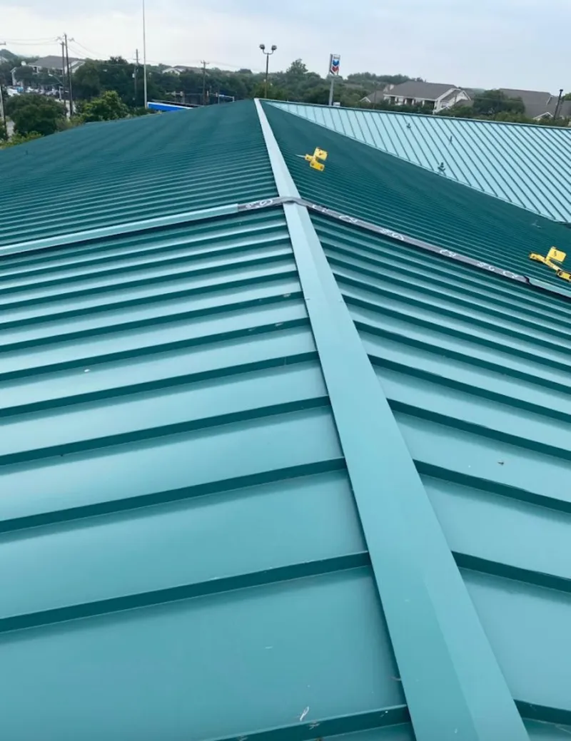 Green commercial metal roof ridge and valley for Metal Roof Repair in Burien